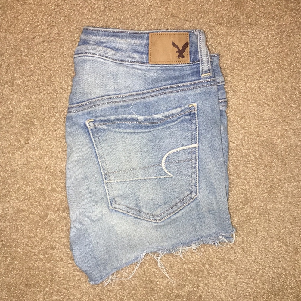 American Eagle Outfitters light wash fringed jean